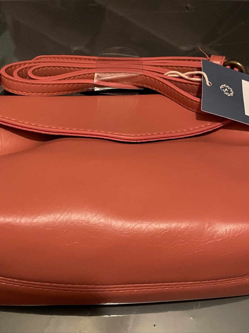 Universal Thread mini crossbody handbag is made of Mauve faux leather